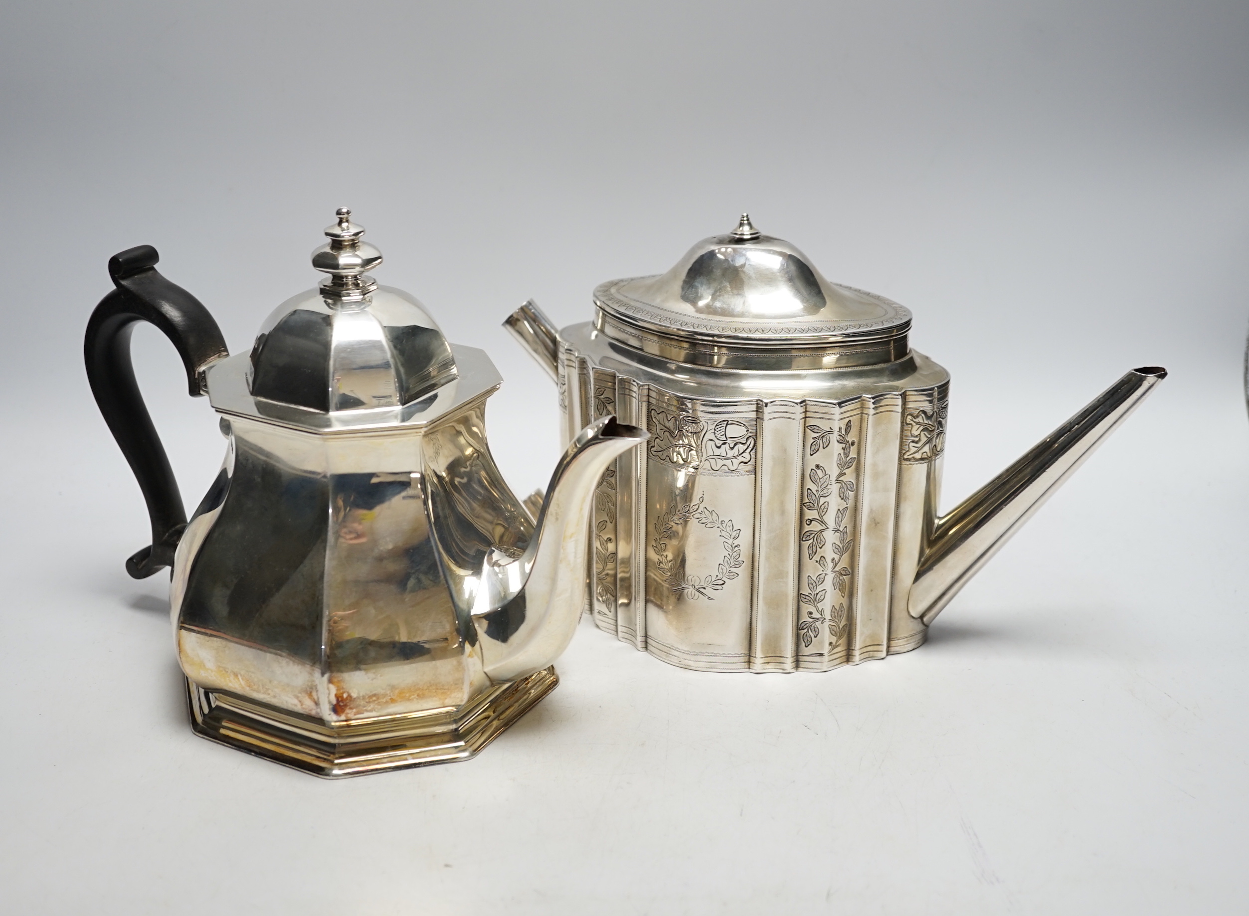 A George V silver octagonal teapot, Atkin Brothers, Sheffield, 1932, together with a George III silver teapot, Robert & David Hennell, London, 1795, (no handle or finial, gross weight 44.9oz.